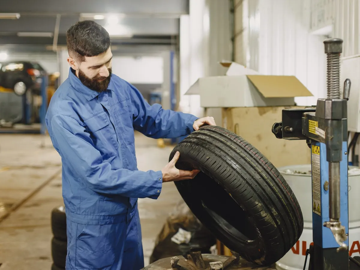 Tyre being balanced at The Tyre Warehouse in Wellington